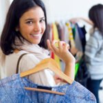 female-with-hanger-with-dress-hand